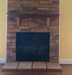 chimney fireplace with stone veneers