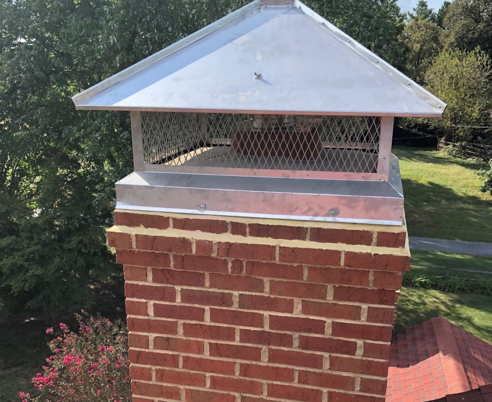 repaired chimney cap installation